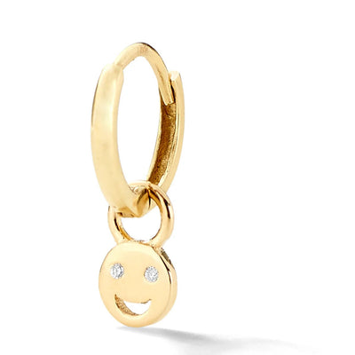 alison lou 14k yellow gold huggie with tiny smiley face with white diamond eyes